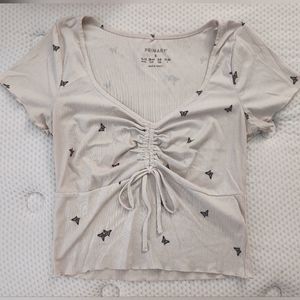 Primark butterfly pattern drawstring white top